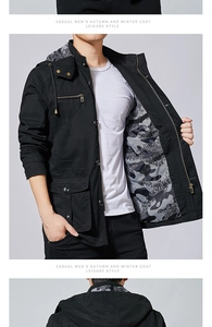 Detail of men's black cotton hooded jacket featuring camouflage lining and utility pockets