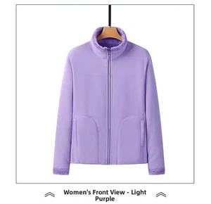 Detail view of light purple fleece jacket with standing collar and zipper pockets