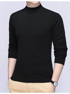 Detail of black mock neck knit sweater showing ribbed cuffs and fine texture for men