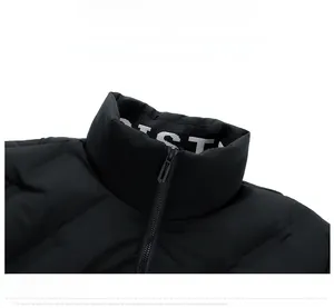 Detail of high-neck puffer jacket collar with zipper and white letter print inside