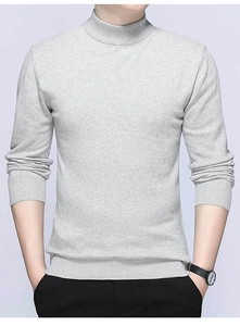 Close-up of the ribbed mock turtleneck collar on a grey slim fit knitted sweater for men