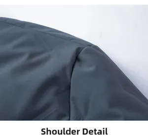 Detailed view of fine stitching on a premium men's business jacket's shoulder area