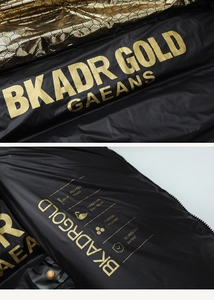 Detail view of premium Hungarian duck down thermal storage lining on a black puffer vest