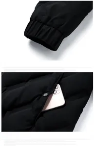 Detail view of elastic cuffs and large side pockets on black padded winter jacket for men