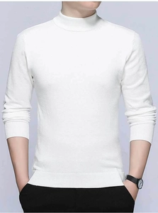 Close-up detail of white knitted sweater with ribbed neckline and fine knit texture