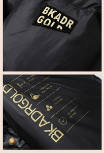 Detail of premium black puffer jacket showing embroidered logo and Hungarian duck down label