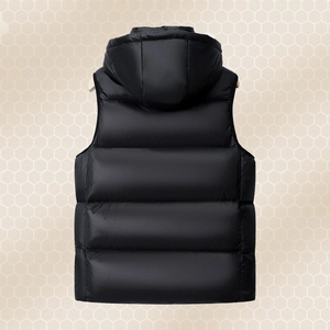 Back view of a black hooded down puffer vest with thick padding and quilted design