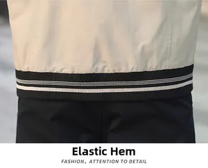 Détail de la veste décontractée pour homme avec ourlet élastique et rayures blanches