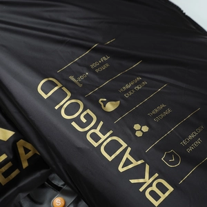 Premium black down vest with golden technical prints and high-quality thermal lining