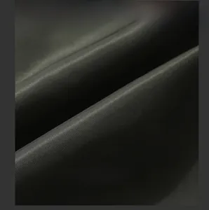 Close-up of black twill fabric texture with durable polyester weave for jacket