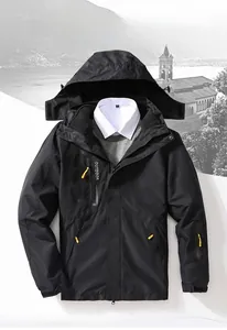 Detail view of black 3-in-1 windproof jacket featuring contrasting yellow zipper accents