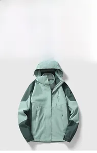 Detail view of mint green waterproof jacket with warm detachable fleece inner lining