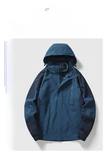 Detail view of outdoor jacket featuring windproof hood and adjustable velcro cuffs