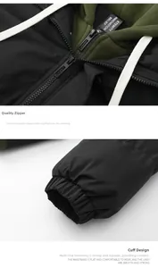 Detail of winter jacket with metal zipper, white drawstrings and elastic cuffs