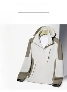 Detail of waterproof windbreaker with adjustable velcro cuffs and zippered pockets