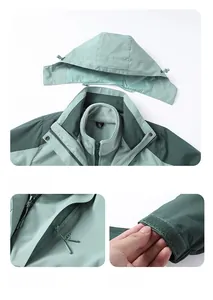 Detail of light green outdoor jacket with detachable hood, zipper pocket and velcro cuffs