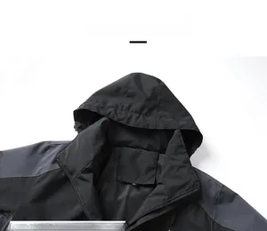 Detail of outdoor jacket collar with breathable mesh lining and size L printed on label