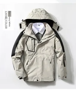 Detail of ivory white waterproof outdoor jacket with zipper pockets and outdoor embroidery