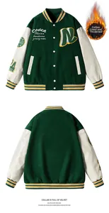 Detail of vintage varsity jacket showing leather sleeves and contrast embroidery