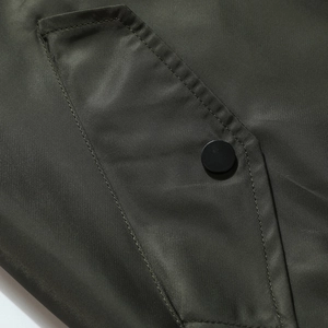 Army green American baseball jacket with twill texture and matte metal button detail