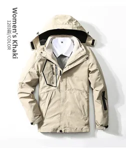 Detail of khaki outdoor jacket showing warm white fleece lining and adjustable cuffs