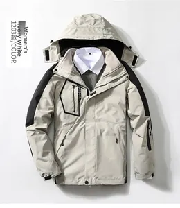 Detail of ivory women's outdoor jacket with black contrast panels and hooded design