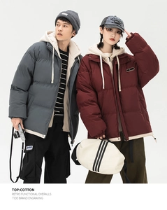 Detail view of cotton padded hooded jackets with contrasting inner lining and retro functional style
