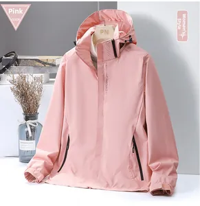 Pink waterproof outdoor jacket detail featuring adjustable hood and EXPLORE logo