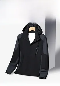 Detail of outdoor jacket with adjustable hood, zipper pocket and velcro cuffs