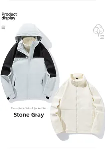 Detail view of gravel grey outdoor jacket with detachable fleece liner and cotton insulation
