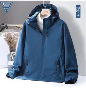 Detail of denim blue windbreaker featuring a stand collar and adjustable drawstring hood