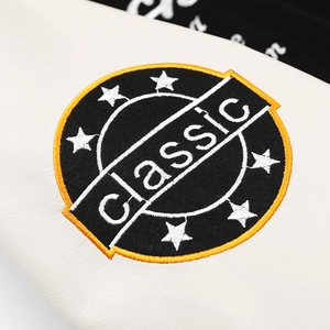 Fashion baseball jacket featuring high-density classic embroidery and white leather texture