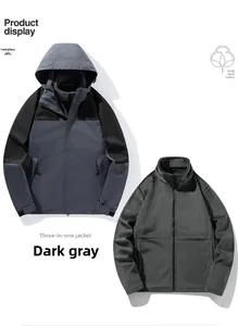 Detail of dark grey three-in-one outdoor jacket with detachable warm fleece liner