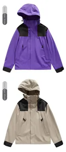 Front view of violet and khaki waterproof hooded outdoor jackets with contrast shoulders