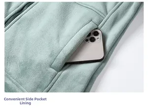 Close-up of portable side pocket on fleece liner showing capacity with a smartphone