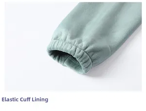 Detail shot of elastic cuffs on a light green fleece liner for outdoor jackets