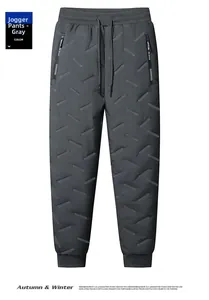 Détail macro du jogging d'hiver gris avec rayures matelassées et poches zippées