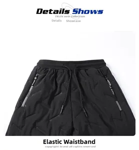 Détail du pantalon matelassé d'hiver pour homme avec taille élastique et poche zippée