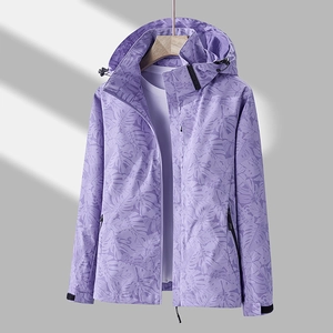 Coupe-vent à capuche violet pour femme avec motifs tropicaux et poignets réglables