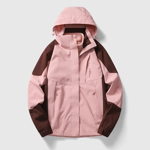 Women's outdoor waterproof softshell jacket in pink and brown with warm fleece lining