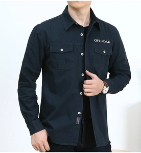 Detail of navy cotton utility shirt featuring white OFF-ROAD embroidery and outdoor label