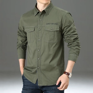 Close-up of military green men's cotton shirt with chest pockets and OFF-ROAD embroidery