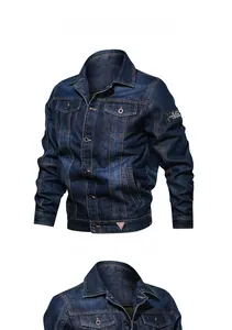 Detail view of washed denim jacket with classic collar and symmetric flap pockets
