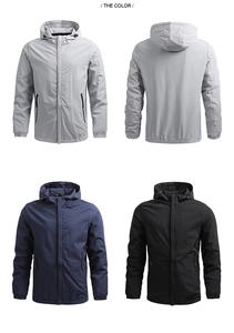 Men's hooded windbreaker jacket in gray, blue, and black with zip pockets and elastic cuffs