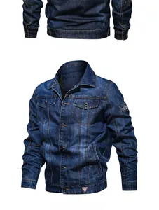 Detail of vintage blue denim jacket featuring washed texture and utility chest pockets