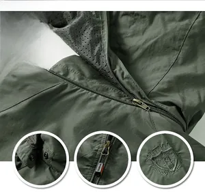 Detail of army green outdoor jacket with detachable hood, zipper, and mesh lining
