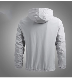 Rear view of a light grey windproof hooded jacket featuring elastic cuffs and hem