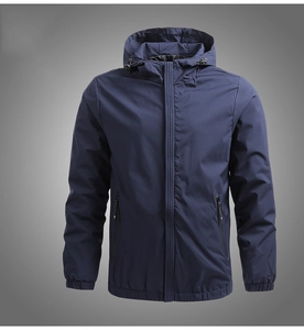 Detail view of navy blue hooded sports jacket with adjustable drawstrings and zippers