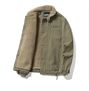 Detail showing the warm beige sherpa fleece lining and collar of the olive green jacket