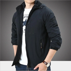Men's black hooded windbreaker jacket with multiple pockets and tactical sleeve badge